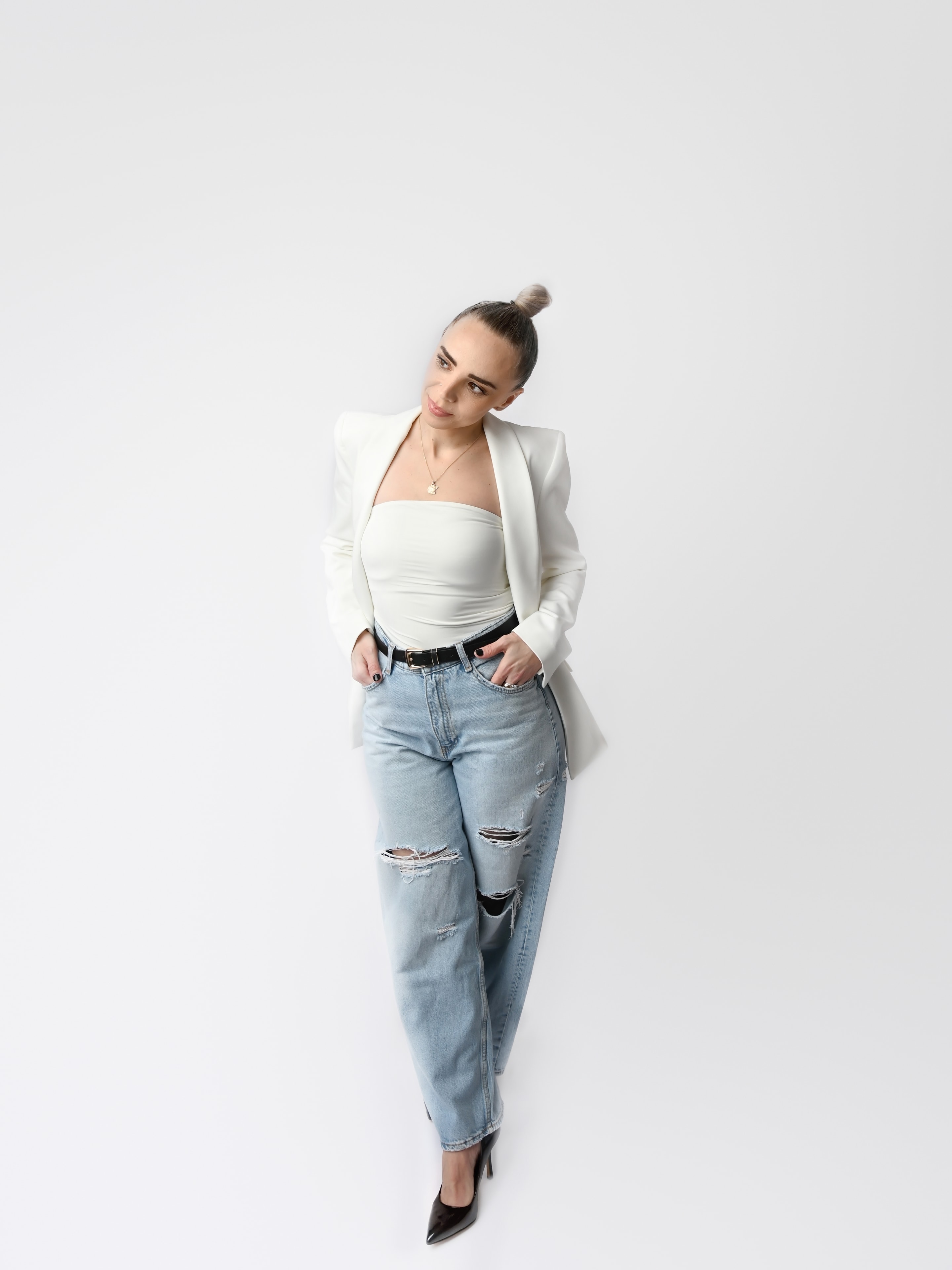 Victoria in a white blazer, editorial portrait at Bayshore Beauty